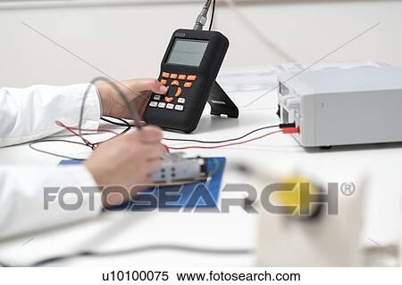 Stock Photography - Circuit board repair.. Fotosearch