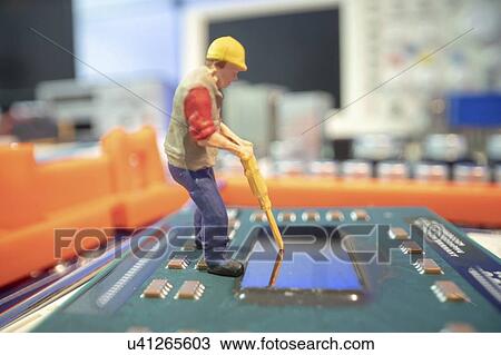 Stock Image - Computer repairs, conceptual image.. Fotosearch