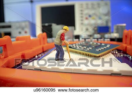 Stock Photography - Computer repairs, conceptual image.. Fotosearch