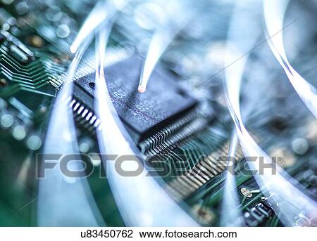 Digital communication, conceptual image. Fibre optics carrying data over electronic circuitry on a laptop computer. View Large Photo Image Stock Image - Digital communication, conceptual image. Fibre optics carrying data over electronic circuitry on a laptop computer.. Fotosearch