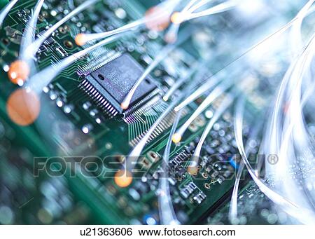 Digital communication, conceptual image. Fibre optics carrying data over electronic circuitry on a laptop computer. View Large Photo Image Stock Photograph - Digital communication, conceptual image. Fibre optics carrying data over electronic circuitry on a laptop computer.. Fotosearch