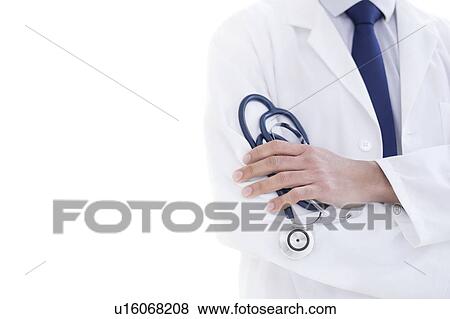 Doctor holding stethoscope, close-up. View Large Photo Image Stock Photo - Doctor holding stethoscope, close-up.. Fotosearch