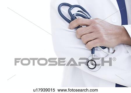 Doctor holding stethoscope, close-up. View Large Photo Image Stock Photography - Doctor holding stethoscope, close-up.. Fotosearch