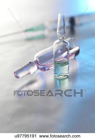 Drug ampules and syringe awaiting injection. View Large Photo Image Stock Image - Drug ampules and syringe awaiting injection.. Fotosearch