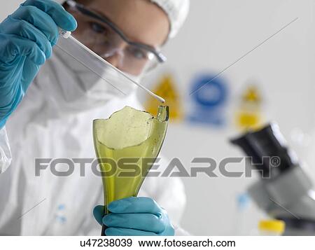 Forensic scientist collecting evidence by taking a DNA (deoxyribonucleic acid) swab from scene of crime bottle. View Large Photo Image Stock Photo - Forensic scientist collecting evidence by taking a DNA (deoxyribonucleic acid) swab from scene of crime bottle.. Fotosearch