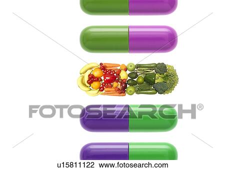 Stock Image - Healthy living, conceptual image. Medicine or fresh fruit and vegetables.. Fotosearch