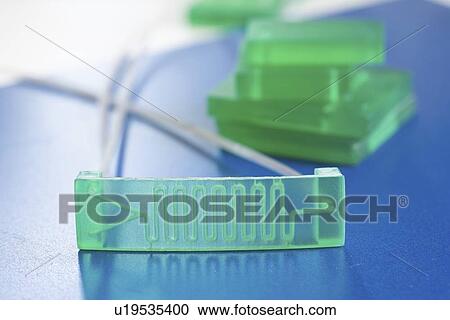 Stock Image - Lab on chip microfluidic device.. Fotosearch