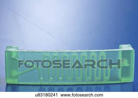 Stock Image - Lab on chip microfluidic device.. Fotosearch