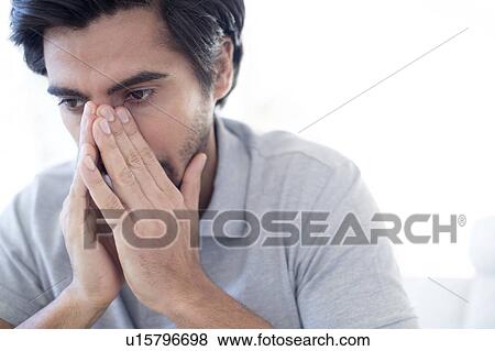 Stock Photo - Man sneezing.. Fotosearch
