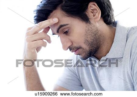 Man touching his forehead. View Large Photo Image Stock Photograph - Man touching his forehead.. Fotosearch
