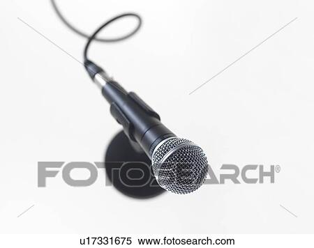 Stock Photography - Microphone awaiting a speaker.. Fotosearch