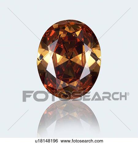 Oval cut citrine. View Large Photo Image Stock Photograph - Oval cut citrine.. Fotosearch