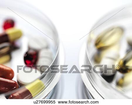 Stock Photography - Pharmaceutical research, conceptual image. A variety of medicines sitting in a petri dish.. Fotosearch