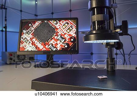 Quality control in microchip factory. View Large Photo Image Stock Image - Quality control in microchip factory.. Fotosearch