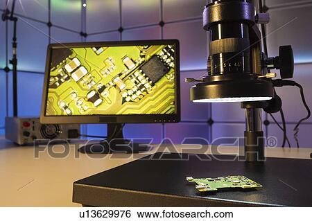 Quality control in microchip factory. View Large Photo Image Stock Photograph - Quality control in microchip factory.. Fotosearch