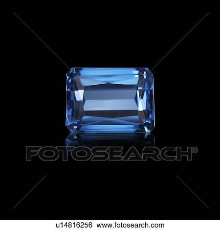 Stock Photograph - Radiant cut emerald.. Fotosearch