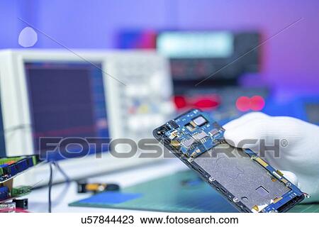 Repairing mobile phone. View Large Photo Image Stock Image - Repairing mobile phone.. Fotosearch