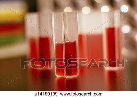 Stock Photo - Samples in quartz cuvettes.. Fotosearch