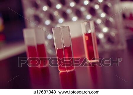 Stock Photo - Samples in quartz cuvettes.. Fotosearch