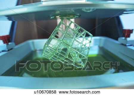 Stock Photo - Stereolithography photopolymer 3d printer.. Fotosearch