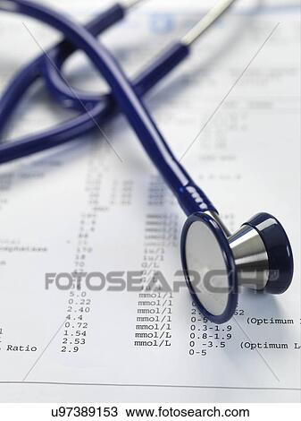Stock Image - Stethoscope sitting on a set of blood results.. Fotosearch