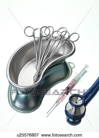 Surgical instruments in a tray alongside a syringe and stethoscope. View Large Photo Image Stock Photo - Surgical instruments in a tray alongside a syringe and stethoscope.. Fotosearch