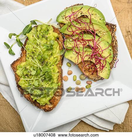 Avocado and bean sprouts on toast View Large Photo Image Stock Photo - Avocado and bean sprouts on toast. Fotosearch