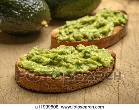 Stock Photo - Avocado on toast. Fotosearch