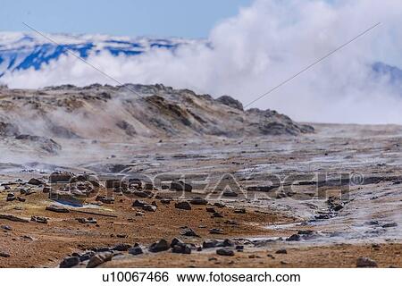Barren landscape with steam rising beyond rocks, Akureyri, Eyjafjardarsysla, Iceland View Large Photo Image Stock Photograph - Barren landscape with steam rising beyond rocks, Akureyri, Eyjafjardarsysla, Iceland. Fotosearch