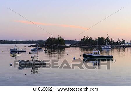 Boats at sunset in Seal Harbor, Mount Desert Island, USA View Large Photo Image Stock Image - Boats at sunset in Seal Harbor, Mount Desert Island, USA. Fotosearch