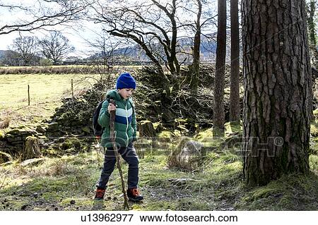 Boy exploring national park, Llanaber, Gwynedd, United Kingdom View Large Photo Image Stock Photo - Boy exploring national park, Llanaber, Gwynedd, United Kingdom. Fotosearch