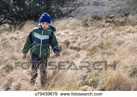 Boy exploring national park, Llanaber, Gwynedd, United Kingdom View Large Photo Image Stock Photo - Boy exploring national park, Llanaber, Gwynedd, United Kingdom. Fotosearch