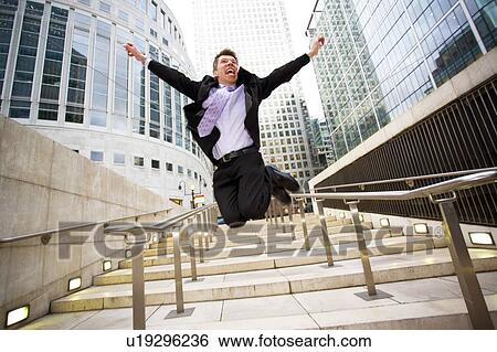 Businessman jumping for joy View Large Photo Image Stock Photograph - Businessman jumping for joy. Fotosearch