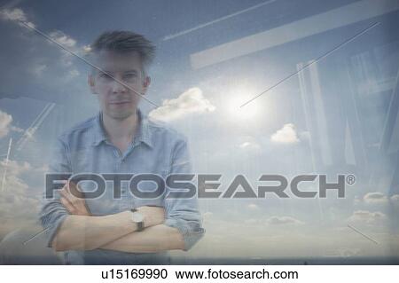 Businessman looking through window View Large Photo Image Stock Image - Businessman looking through window. Fotosearch