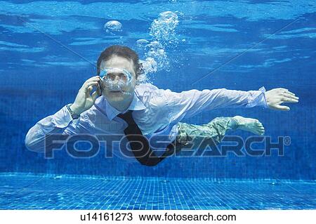 Businessman underwater View Large Photo Image Stock Image - Businessman underwater. Fotosearch