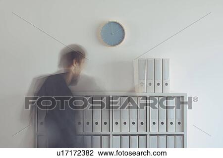 Busy archive administrator View Large Photo Image Stock Image - Busy archive administrator. Fotosearch