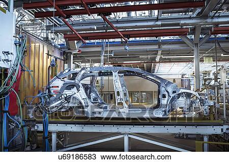 Car body on production line in car factory View Large Photo Image Stock Image - Car body on production line in car factory. Fotosearch