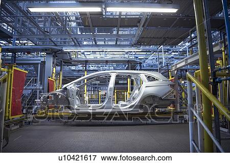 Stock Photo - Car body on production line in car factory. Fotosearch