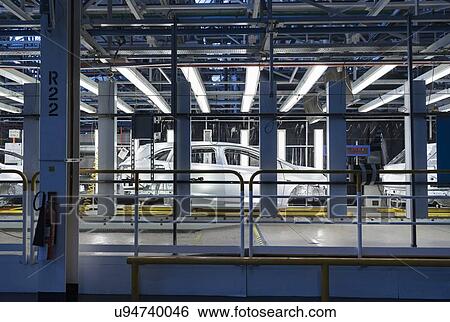 Stock Photograph - Car body on production line in car factory. Fotosearch