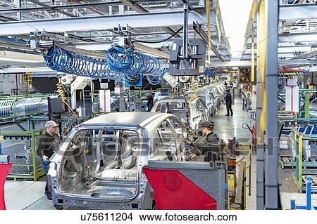Cars on production line in car factory View Large Photo Image Picture - Cars on production line in car factory. Fotosearch