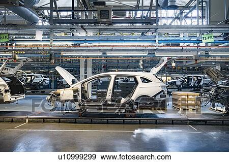 Stock Photo - Cars on production line in car factory. Fotosearch