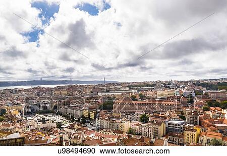 Stock Image - Central Lisbon with Ponte 25 de Abril, Lisbon, Portugal. Fotosearch