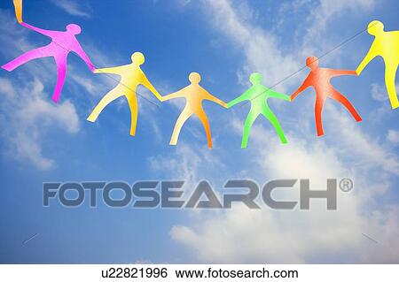 Coloured paper dolls holding hands View Large Photo Image Stock Photograph - Coloured paper dolls holding hands. Fotosearch