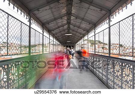 Stock Photograph - Commuters on Elevador de Santa Justa, Lisbon, Portugal. Fotosearch