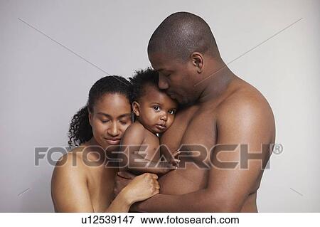 Couple and baby boy View Large Photo Image Stock Photo - Couple and baby boy. Fotosearch