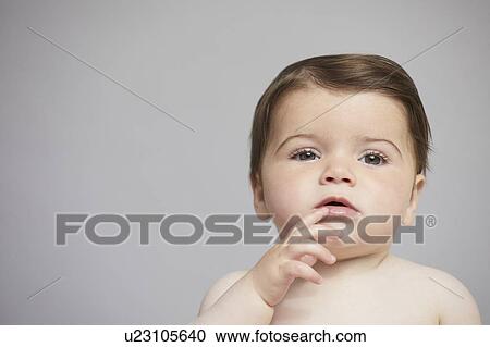 Curious baby girl View Large Photo Image Stock Image - Curious baby girl. Fotosearch