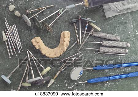 Stock Image - Dental prosthesis laboratory. Fotosearch