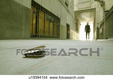 Dropped wallet View Large Photo Image Picture - Dropped wallet. Fotosearch