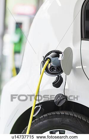 Stock Photography - Electric car charging batteries. Fotosearch