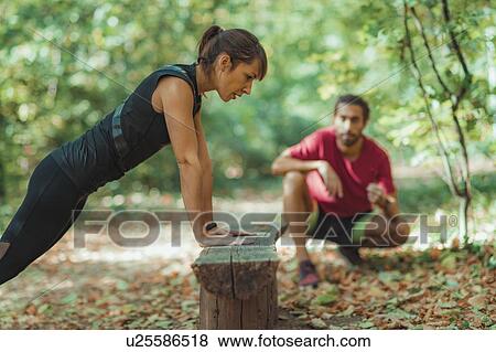 Exercising in the park View Large Photo Image Stock Photo - Exercising in the park. Fotosearch